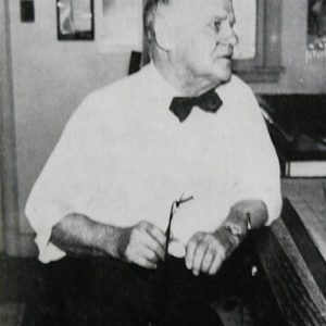 At his drafting table in his Dartmouth home office (1961 at 82 years of age.)