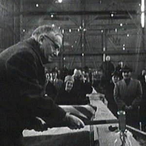 Helping to drive the golden spike marking the keel laying of Bluenose II in 1963.